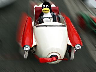 [rasender Tux im Oldtimer]